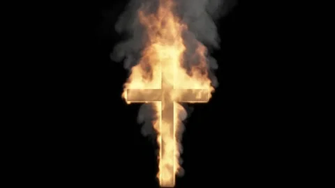 The camera looks directly at the blazing cross against a black background. Stock Footage 171016512
