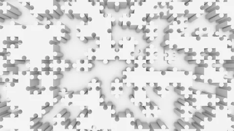 The camera looks down at the animation of white self-moving puzzles. Seamless Video stock 125895702