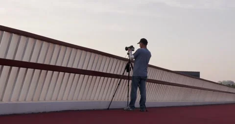 Camera man on the bridge Stock Footage 198962707