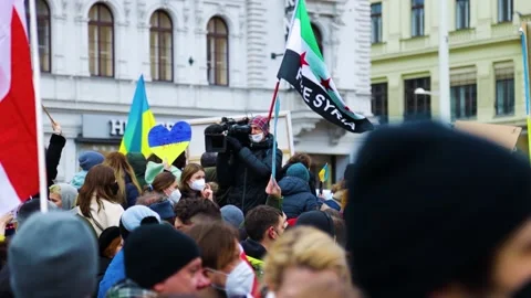 A camera man filming a protest in Vienna, Austria Stock Footage 171125249