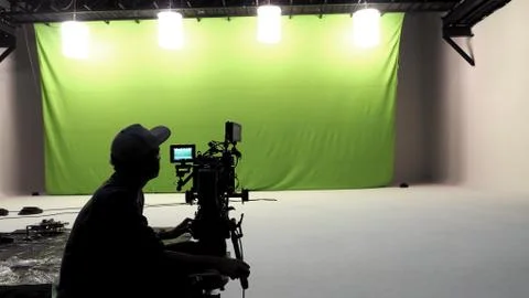 Camera man working in studio. Stock Photos