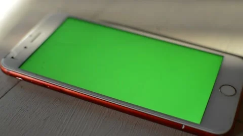 Camera motion on a iphone with green screen display. iphone chromakey. Stock Footage 232996101
