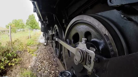 Camera mounted onboard of steam train locomotive. steel wheels Stock Footage 43619225