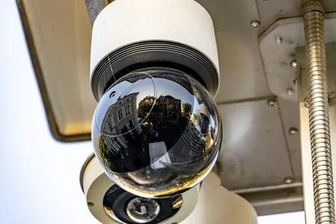 A camera is mounted on a pole and is looking down Stock Photos