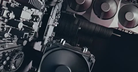 Camera move along components. Working motherboards, graphic cards and fans. Video stock 336018254