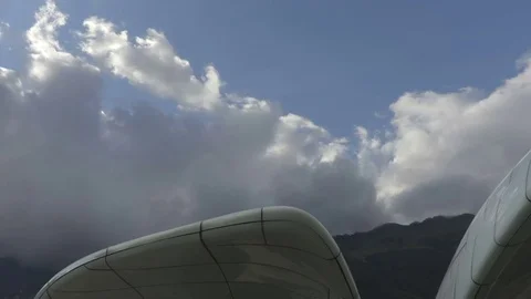 Camera move along the modern architecture shapes with the sky on the background Stock Footage 81935345