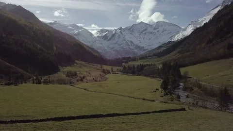 Camera move up with an amazing view on the Alps - Aerial Stock Footage 83829418