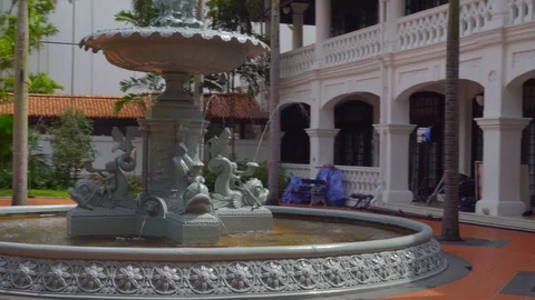 Camera move around a beautiful waterfall with an amazing sculpture statue Stock Footage 116491474