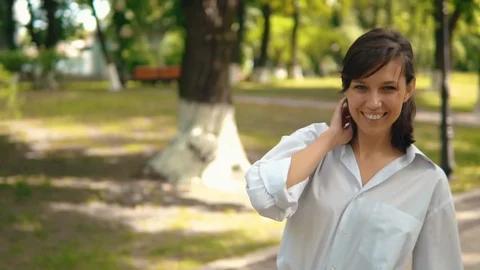 Camera move around cheerful brunette slow motion Stock Footage 125961882
