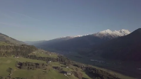 Camera move bove the green hill on the mountain - Aerial Stock Footage 83834628