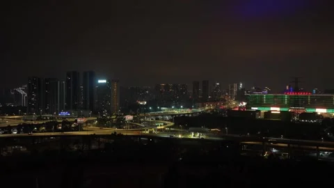 Camera move into building hole Round circle china landmark night city background Video stock 340623929