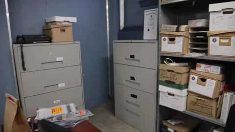 Camera move from evidence locker to police precinct station 動画素材 265923855