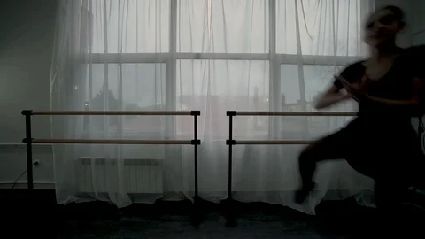 Camera move off horizontally along the dance class. Ballerinas make jumps close Stockbeeldmateriaal 113530281