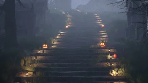 Camera move over a staircase illuminated with lanterns and pumpkins at midnight Stock Footage 209928343