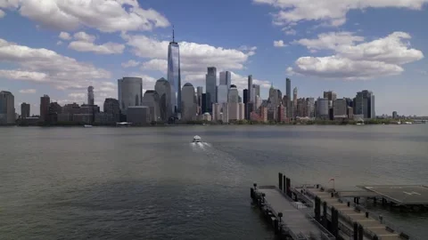 Camera move right through the pier. New York. boat sailing on Hudson river Stock Footage 240688467