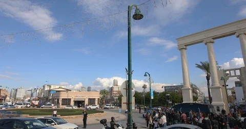 Camera moved clockwise on people near christmas tree 스톡 동영상 102511484