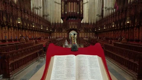 Camera movement from above the lectern to the priests' box of york minster Stock Footage 248702623
