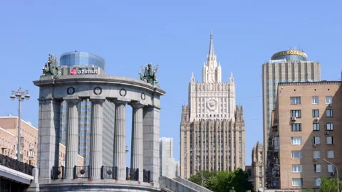 Camera movement along city skyline with prominent towers Stock-Footage 336013904