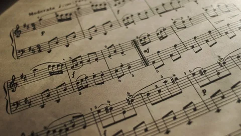 Camera movement along a musical notepad, close up, macro view, slider moving Stock-Footage 126862830