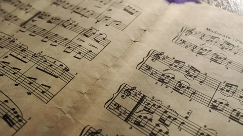 Camera movement along a musical notepad, close up, macro view, slider moving Stock Footage 126862837