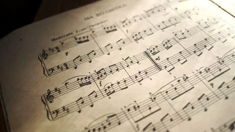 Camera movement along a musical notepad, close up, macro view, slider moving Stock-Footage 126862858