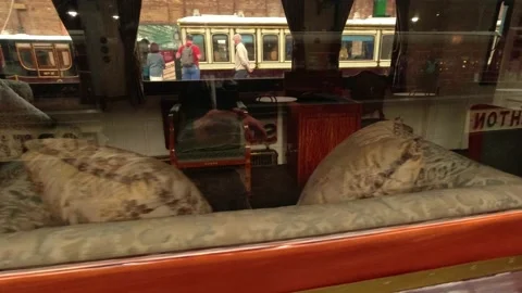 Camera movement along an old first class carriage - railway museum in York, UK Stock Footage 248992976