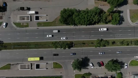 Camera movement along the road along which cars drive top view. Stock Footage 146309035