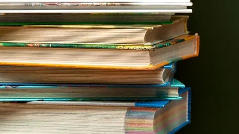 Camera movement along a stack of books Stock-Footage 74311338