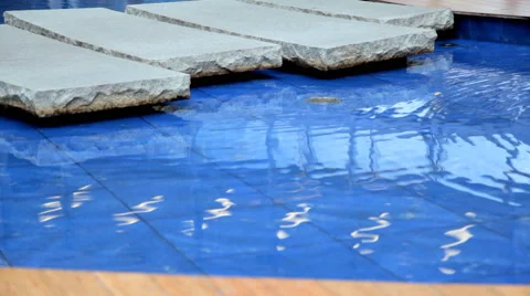 Camera movement along a stone path to the pool Stock-Footage 64026672