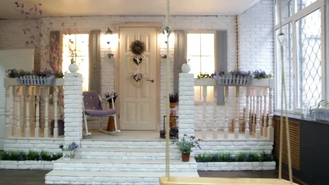 Camera movement around the decoration of the facade of the rural house Stock Footage 92632380