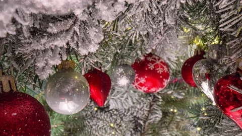 Camera movement between branches and Christmas tree decorations. Christmas Stock Footage 222215873