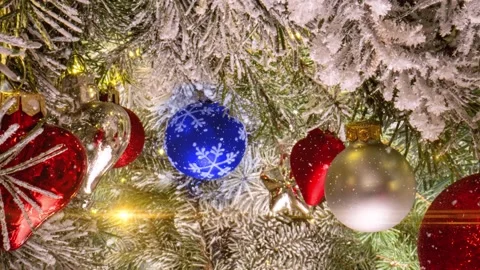 Camera movement between branches and Christmas tree decorations. Christmas Stock Footage 222808094
