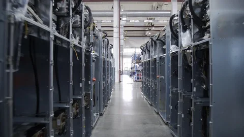 Camera movement between electrical boxes in Factory Stock-Footage 117365143