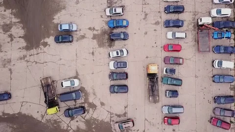 Camera movement downward view of the parking lot of cars evacuated for Stock Footage 143314460