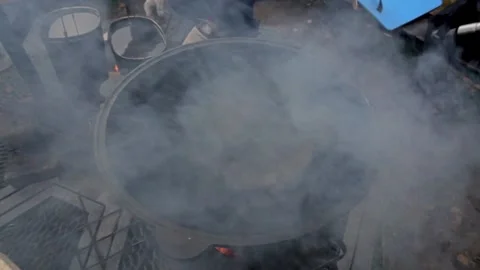 Camera movement to an empty cauldron, in which food will soon be cooked. Video stock 169786217