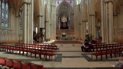 Camera movement from the floor towards the altar of york minster in york, uk Stock Footage 248626355