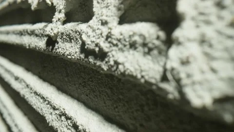 Camera movement by fresh concrete tehture with patterns of notched trowel. Macro Stock Footage 227571807