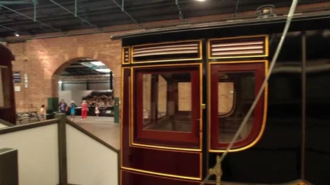 Camera movement looks around station with wagons - railway museum in york, uk Stock Footage 248992931