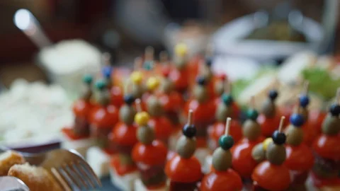 Camera movement over the buffet table where snacks stand Video stock 125906060