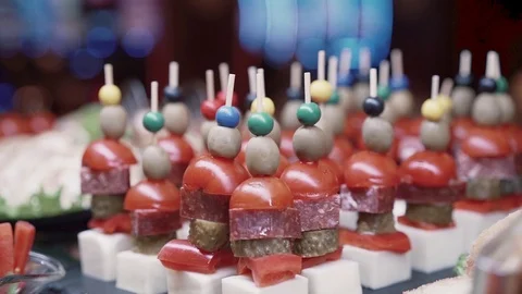 Camera movement over the buffet table where snacks stand Stock Footage 126061031