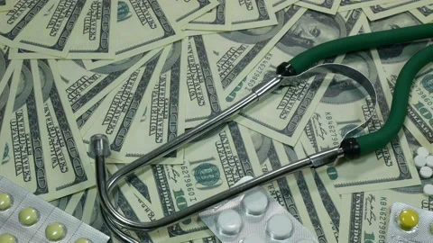 Camera movement over money and medicine 動画素材 89452978