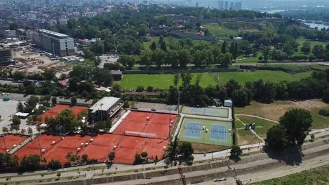 Camera movement over sport area in background the city Stock Footage 237797905