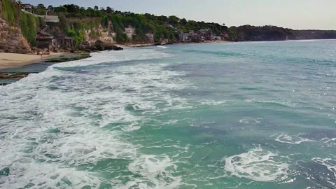 Camera movement over the waves of the blue ocean Stock Footage 263687357