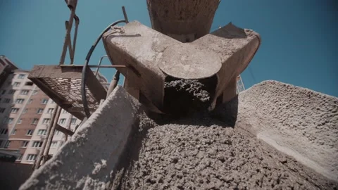 Camera movement on the way of pouring concrete from a concrete mixer Stock Footage