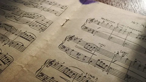 Camera moves above a notebook with notes, close up, macro view, slider moving Video stock 126862901