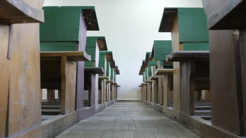 Camera moves across the floor in old retro classroom, lecture hall Stock Footage 248298728