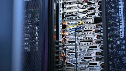 Camera moves across server rack in modern data center with flashing led lig.. Stock Footage 339376618