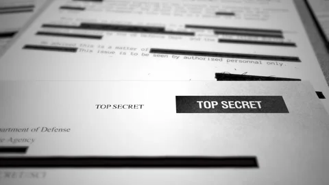 Camera moves across various top secret paper and documents with official stamps Stock Footage 310856802