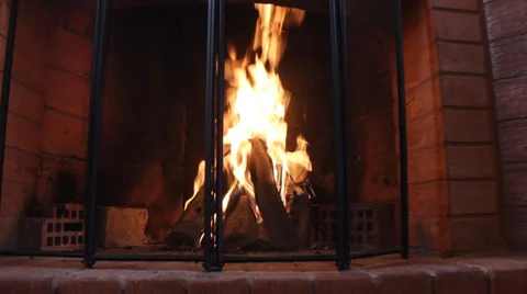 The camera moves along the burning fireplace Stock Footage 37545526
