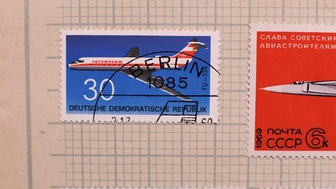 Camera  moves along the collection album with stamps, close up, macro Stock Footage 126759092